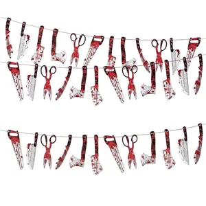 Spooky Halloween bloody weapon garland banner featuring blood-stained knife axe saw and scissors