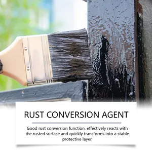 Close-up of brush applying black rust conversion agent to metal surface for protection.
