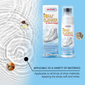 Close-up of Jakehoe white shoe foam cleaner packaging and built-in brush applicator detail
