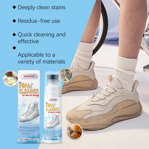 Portable Jakehoe white shoe foam cleaner showing spray bottle and usage on sneakers.