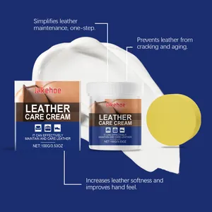Macro detail of Jakehoe leather care cream showing white texture and yellow sponge