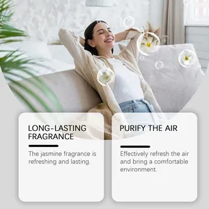A happy woman relaxing at home with fresh jasmine scented indoor air freshener spray