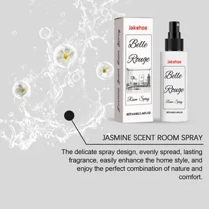 Professional detail view of Jakehoe jasmine room spray bottle with water splash and flowers