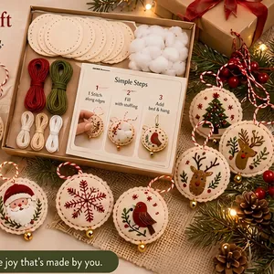 DIY felt Christmas ornament kit with Santa and reindeer designs for holiday crafting