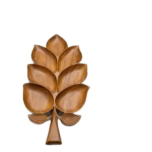 Natural wooden leaf-shaped serving tray featuring eight separate divided compartments