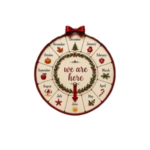 Roue de compte à rebours de Noël festive avec icônes saisonnières et nœud rouge décoratif.