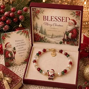 Detailed view of Christmas blessings bracelet with Santa charm in festive gift box