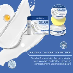 Detailed view of white shoe cleaning cream showing paste texture and sponge applicator