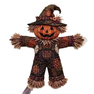 Handmade Halloween patchwork scarecrow DIY kit featuring a quilted pumpkin head design