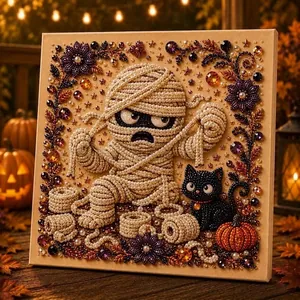 Detailansicht eines DIY-Perlenkunstsets mit Mumie und schwarzer Katze für Halloween.