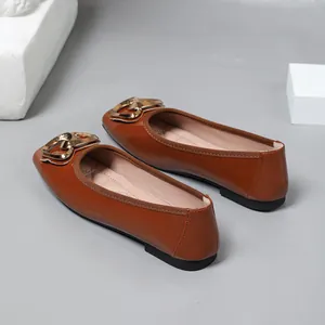 Elegant brown patent leather ballet flats with square toe and golden buckle detail