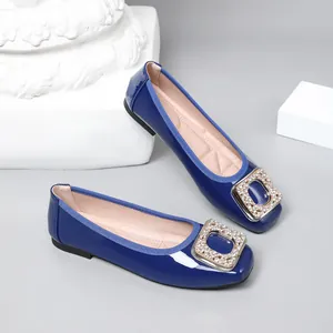 Royal blue patent leather ballet flats with a sparkling rhinestone square buckle