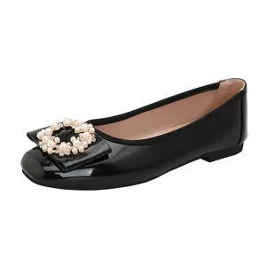 Elegant black patent leather ballet flats with pearl-encrusted square buckle ornament