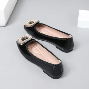 Elegant black patent leather flat shoes with sparkling rhinestone square buckle detail