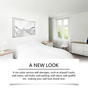 Clean white bedroom wall restored using effective wall repair agent for a new look.