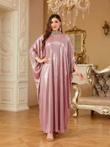 Full length view of elegant pink shimmering kaftan dress with rhinestone detailing