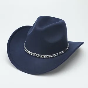 Close-up detail of a navy blue felt cowboy jazz hat with a silver chain decoration.