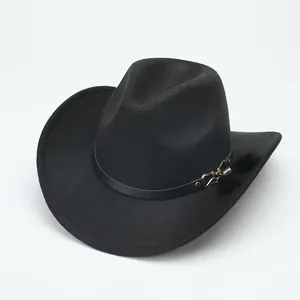 Close-up view of a classic black wool felt Western cowboy hat with leather band