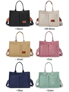 Bolso tote de lona de gran capacidad con múltiples bolsillos y correas anchas en seis colores