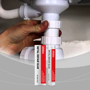 Jakehoe metal repair glue 50g tube and box, detail showing plumbing repair usage