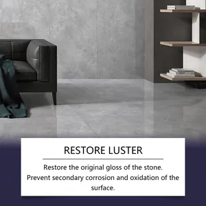 Detail showing polished grey stone tiles in a modern living room scene