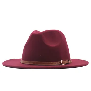 Elegant burgundy wool felt fedora hat featuring a stylish brown leather belt strap
