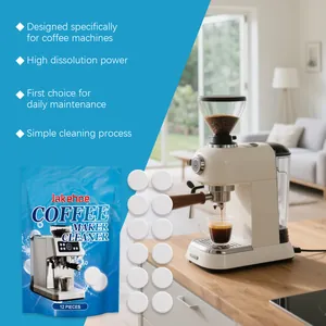 Coffee machine cleaner tablets in blue packaging with a home kitchen background.