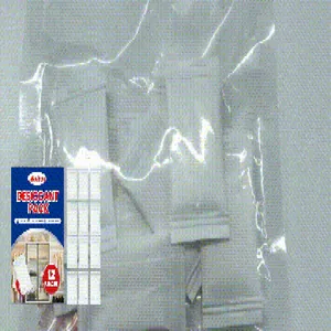 Close-up of JAKEHOE desiccant packs in a clear plastic bag for moisture absorption