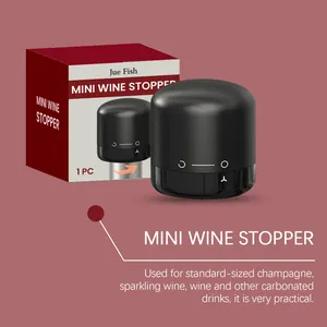 Compacte zwarte mini-wijnstop voor mousserende wijnflessen met siliconen afdichting.