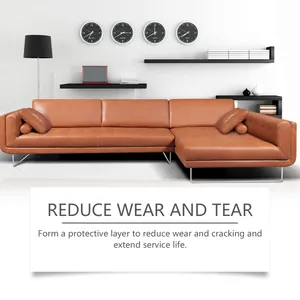 Modern orange leather sofa demonstrating protective effects of leather care treatment
