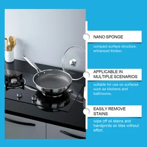 Professional nano cleaning sponge effectively removing stains from kitchen stoves and tiles.