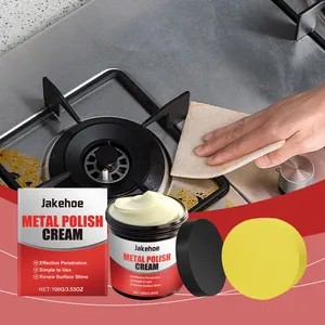 Detail view of metal polish cream showing effective cleaning on gas stove