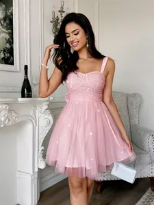 Elegant pink sparkly tulle cocktail dress with sequin details for evening parties.