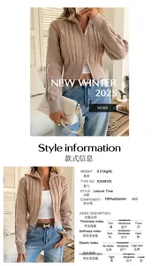Detail view of cable-knit zip-up cardigan with 100% polyester material specifications