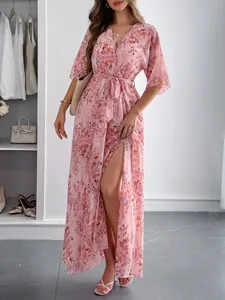 Elegant floral print wrap maxi dress with tie-waist for summer vacation.