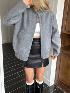 Casual grey wool-blend jacket for women paired with a chic black leather mini skirt