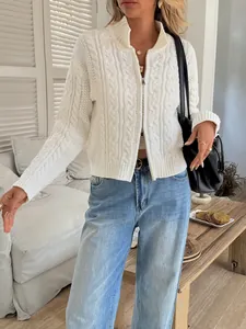 Chic white cable-knit zip-up cardigan sweater for women in a cozy indoor setting