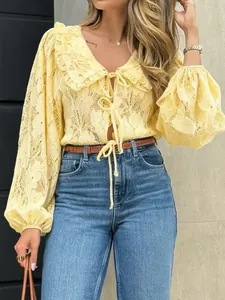 Elegant French vintage yellow lace blouse with puff sleeves and tie-front collar
