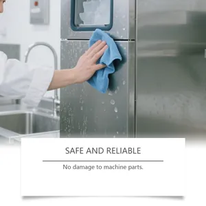 Microfiber cloth cleaning a stainless steel ice machine surface safely.