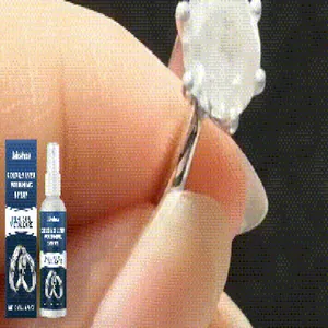 Close-up detail of JAKEHOE jewelry polishing spray bottle and a shiny silver ring