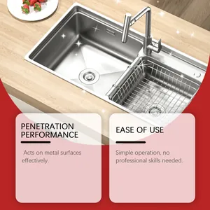 Detail showing shiny stainless steel sink after using effective metal polishing cream