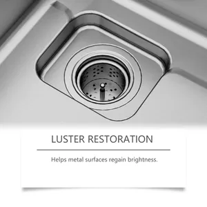 Close-up of shiny stainless steel sink drain showcasing metal luster restoration