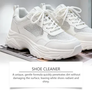Detail of clean white sneakers showing the effect of a gentle shoe cleaner kit.