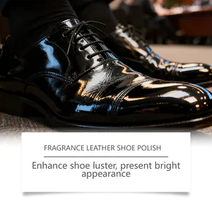 Detail view of glossy black leather shoes treated with fragrance leather shoe polish