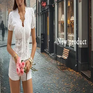 Detailed view of white French style eyelet embroidery puff sleeve top for women