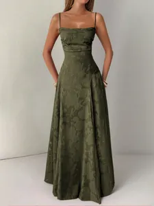 Elegant olive green floral jacquard maxi dress with thin spaghetti straps for vacation.