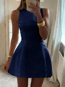 Detail view of navy blue crew neck sleeveless A-line dress with slim waist design