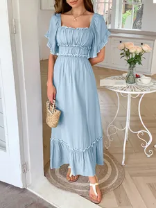 Detail view of light blue ruffled sleeve maxi dress in casual resort style with high waist
