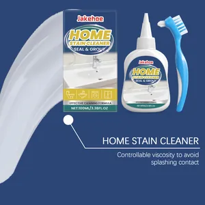 Close-up of household stain cleaning gel with brush for grout and bathroom seals