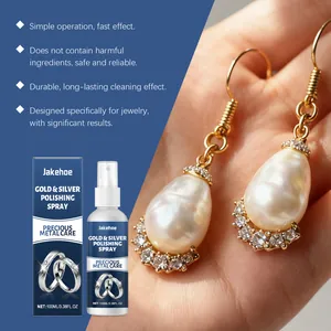 Professional jewelry polishing spray for gold and silver care shown on pearl earrings